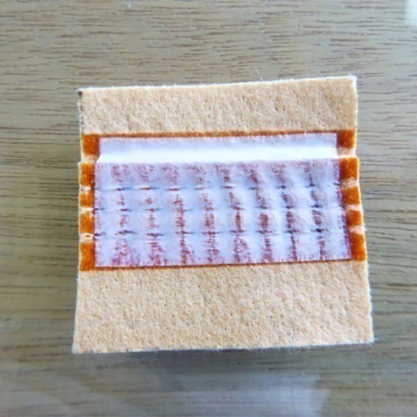 Kömür yakıtlı enerji santrallerinde filtre torbası sızıntısı önleme seçenekleri: yapışkan kaplama işleminin karşılaştırılması ve PTFE bant uygulama işlemi